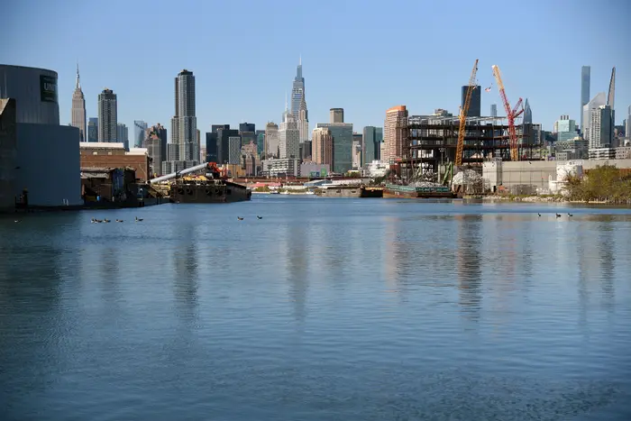 The Newtown Creek is a 3.8 mile long tributary of the East River, flowing along the border between Brooklyn and Queens in New York City.